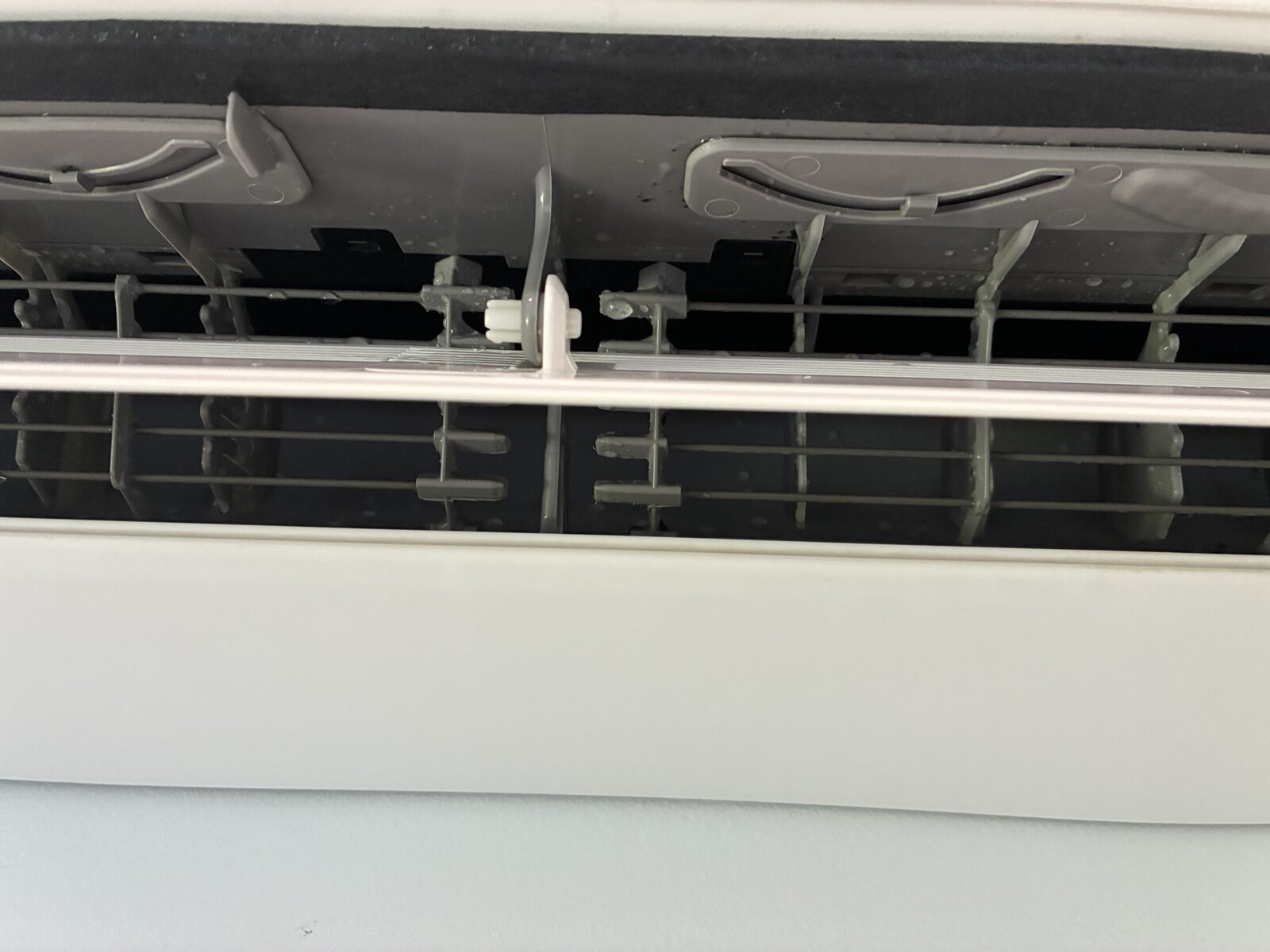 The same aircon fan and coils clean and glossy after an ACcleanQLD hydro-clean